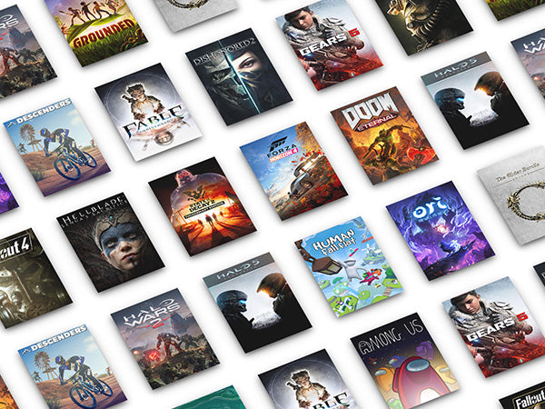 Collection of various video game cases on a white background