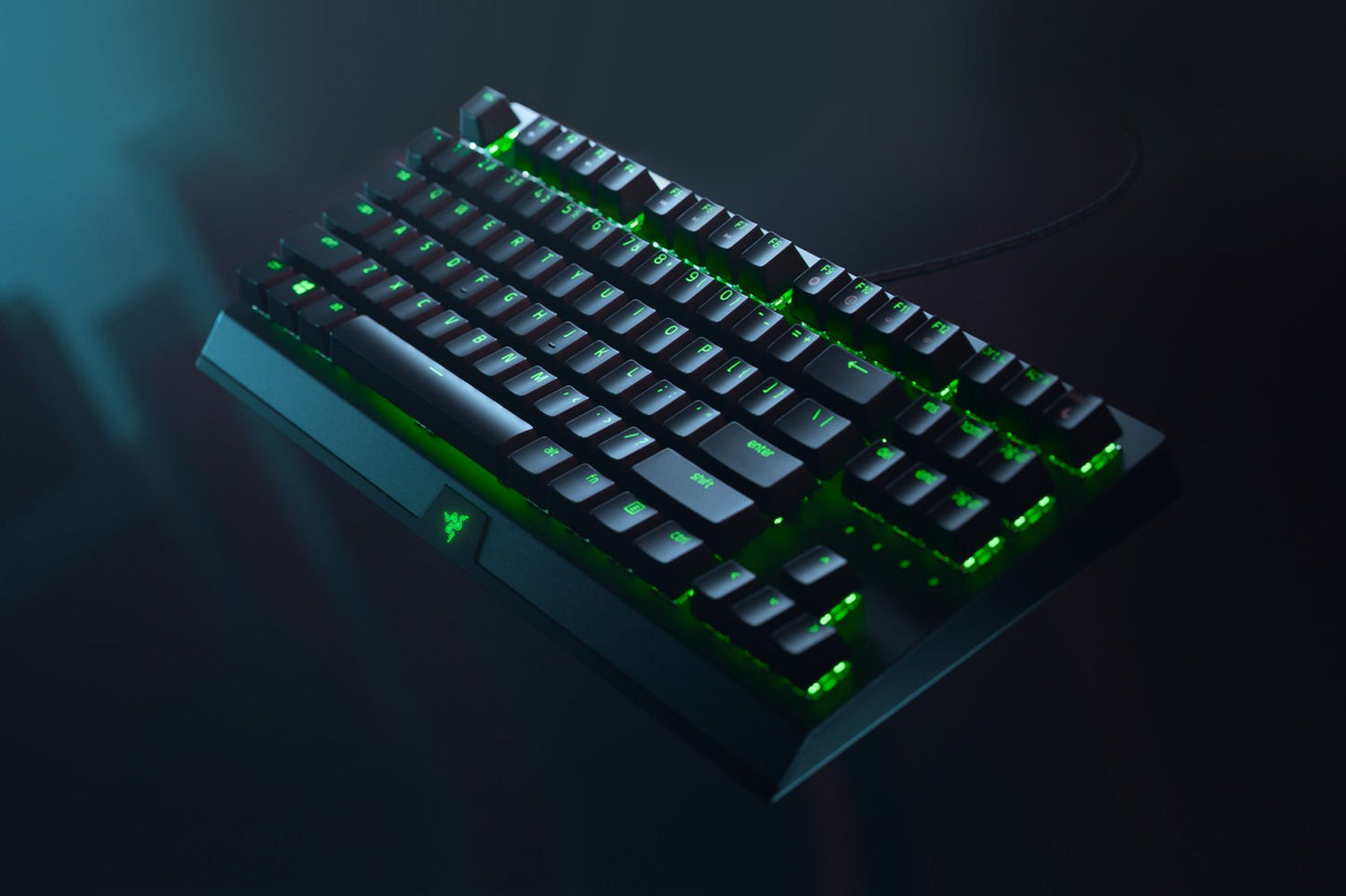 Side view of Razer BlackWidow V3 Tenkeyless mechanical keyboard, showcasing the slim, space-saving design and durable construction.