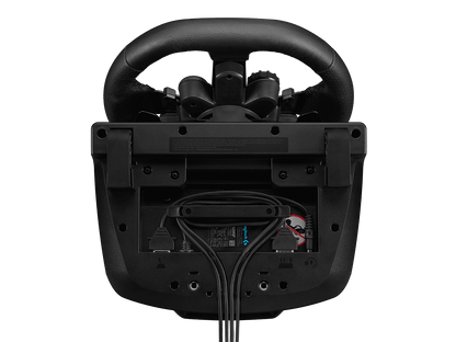 Logitech G923 Racing Wheel in a professional racing simulator setup with monitors and gaming chair.
